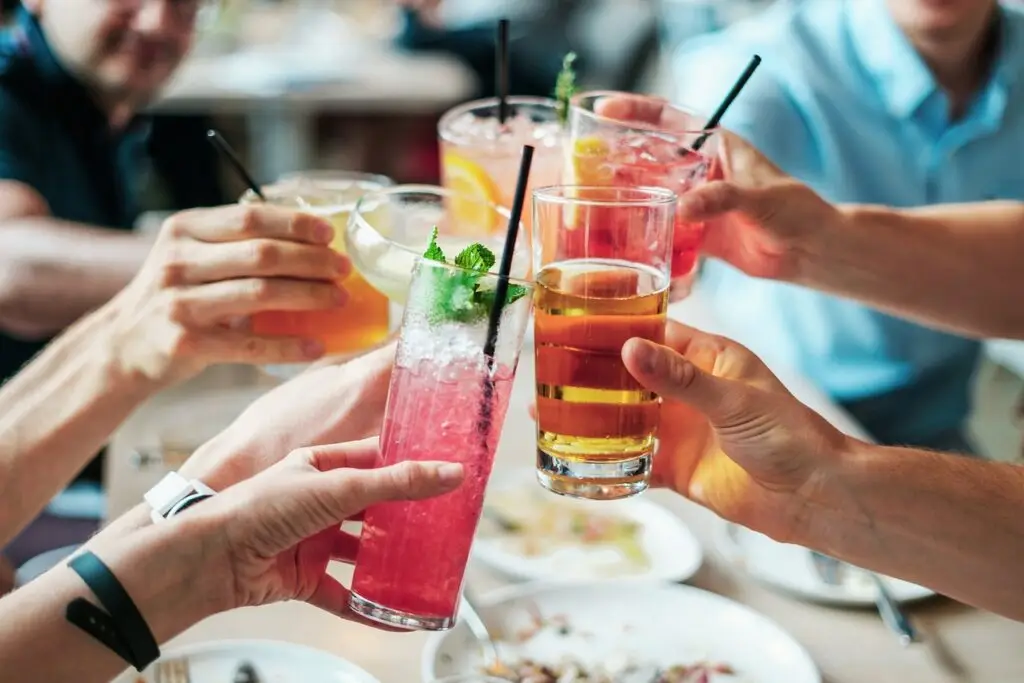 happy holidays, cocktails, drinks, alcohol, alcoholic, glass, beverage, party, alcoholic drinks, cold, restaurant, liquor, celebration, drinking, summer, fresh, juice, red, refreshment, nature, saluting, straws